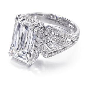 Unique Engagement Ring with an Emerald Cut Diamond and Round Diamond Setting