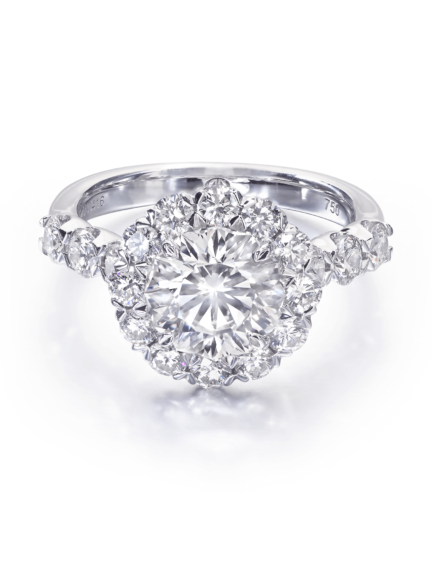 Round diamond engagement ring in white gold with simple setting