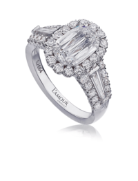 18K white gold diamond engagement ring with halo and tapered baguettes.