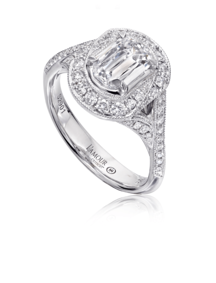 Deco inspired diamond engagement ring set in 18K white gold with pave setting