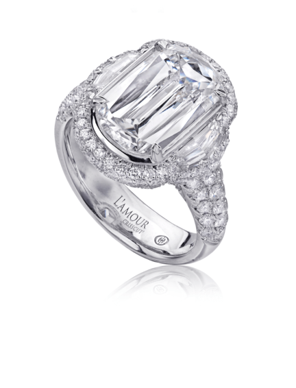 Impressive diamond engagement ring in 18K white gold with unique side diamonds and pave setting