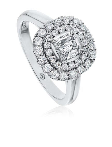 Cushion cut halo engagement ring in classic white gold setting