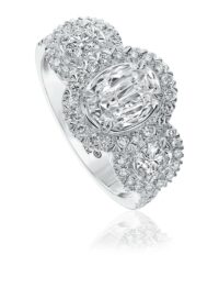Oval cut engagement ring with round diamond sides and halo design setting