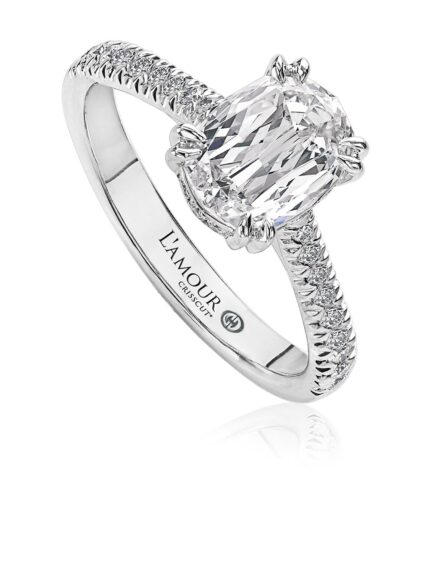 Oval solitaire engagement ring with pave set diamond band