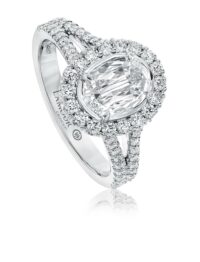 Oval halo engagement ring with pave set split shank