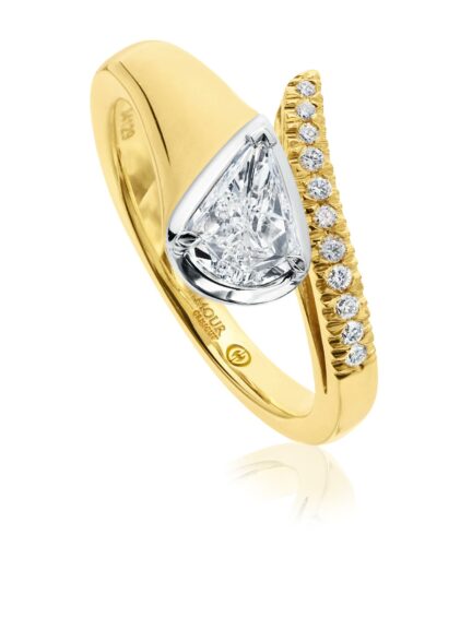 Pear shaped engagement ring in yellow gold setting