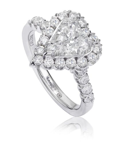 Unique heart shaped diamond engagement ring set in 18K white gold