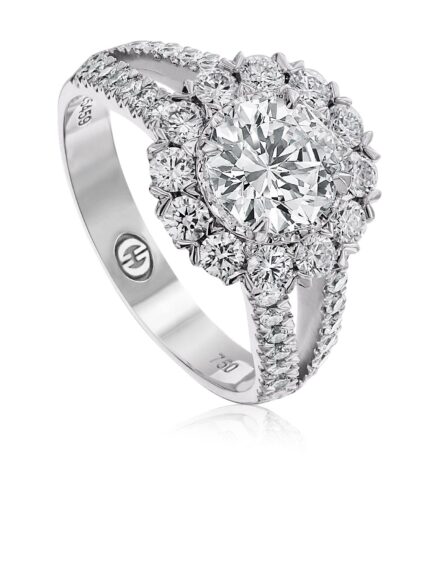 Halo engagement ring setting with pave set round diamond split shank