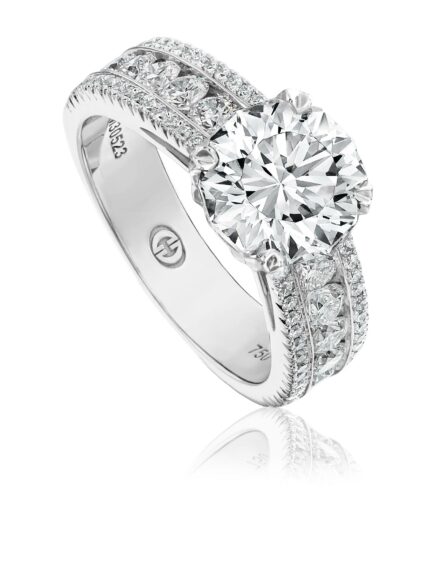 Unique solitaire engagement ring setting with channel set round diamonds
