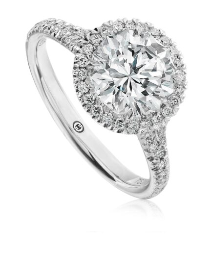 Classic halo engagement ring setting in white gold