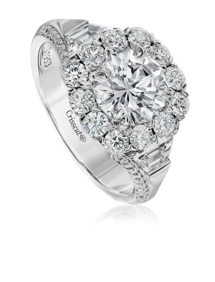 Round diamond halo engagement ring setting with trapezoid cut side diamonds
