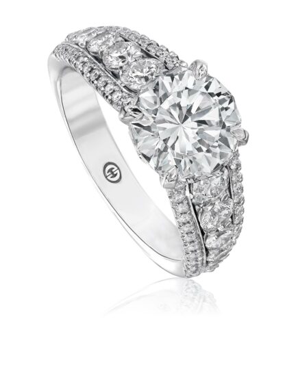 Classic solitaire engagement ring with unique 3 row diamond band