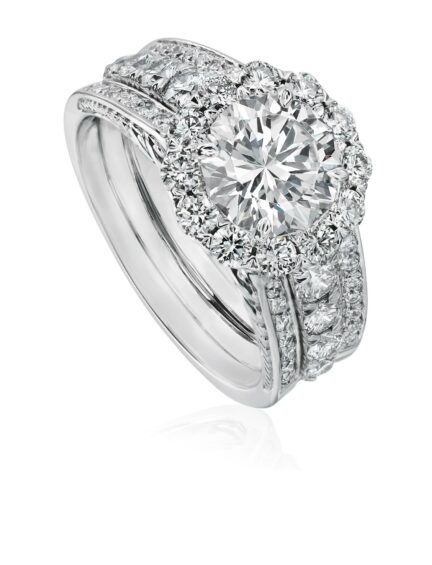 Elegant, one a of kind halo engagement ring setting with round diamond accents