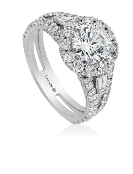 Round diamond halo engagement ring with tapered baguette and diamond band