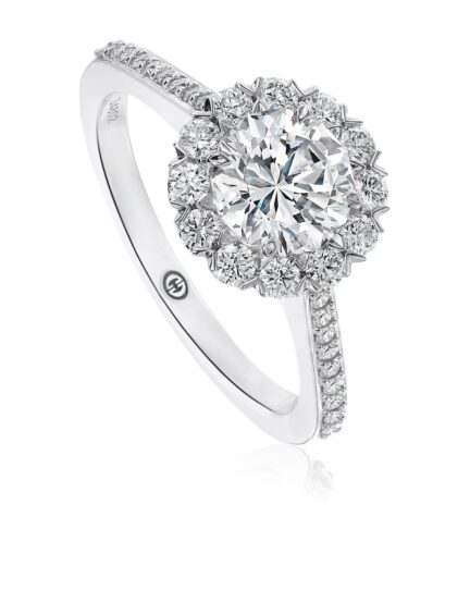 Simple engagement ring setting with a halo with pave set diamond band