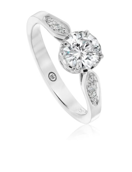 Simple solitaire engagement ring setting with round diamonds