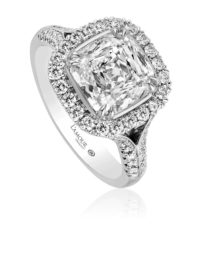 Cushion cut diamond engagement ring with halo design in white gold