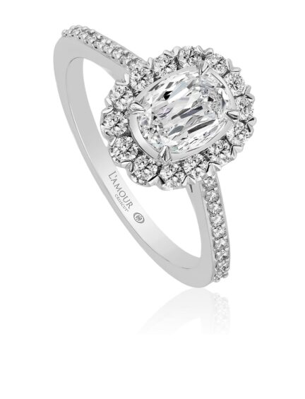 Simple oval engagement ring with halo and diamond band